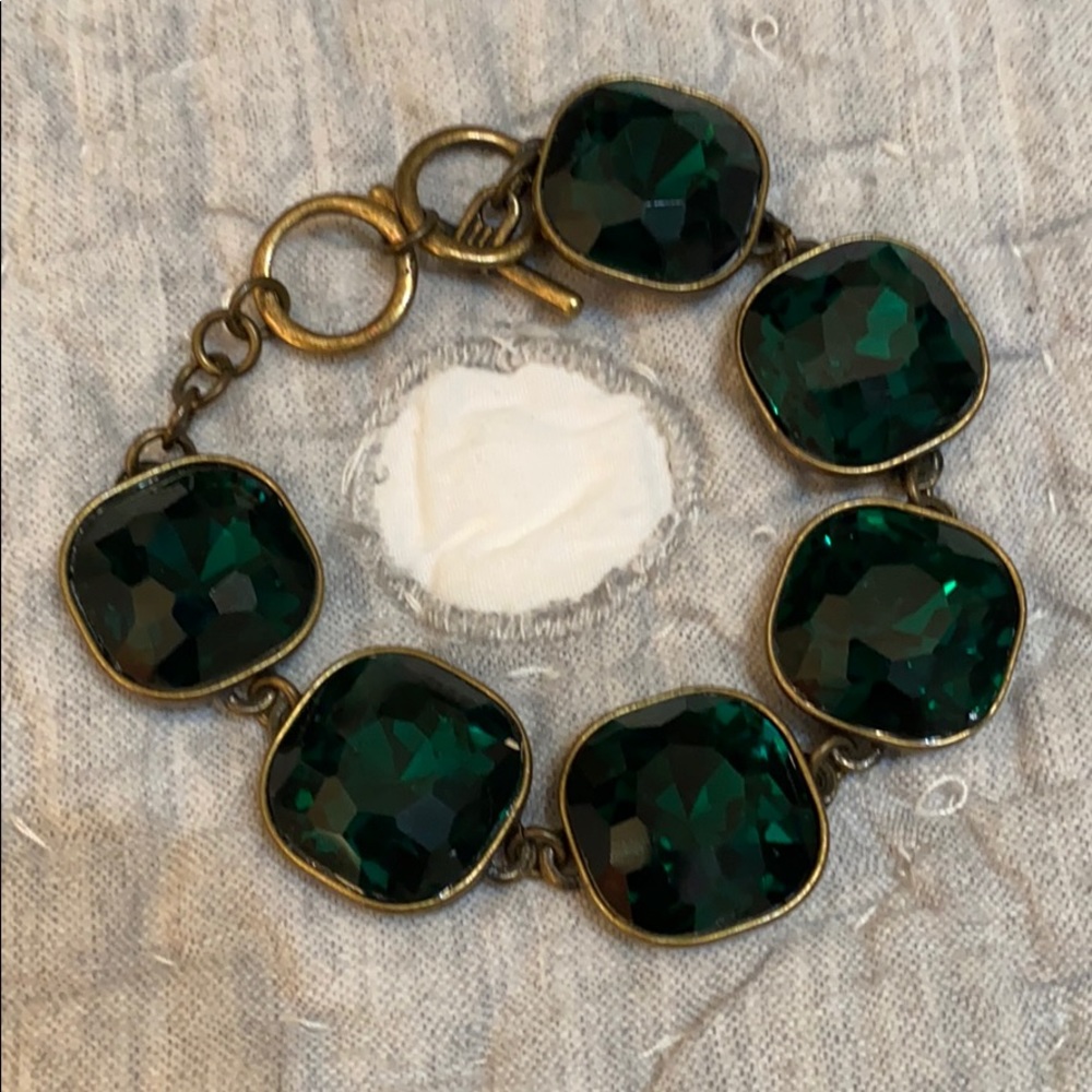 Green stone bracelet with antique gold toned metal